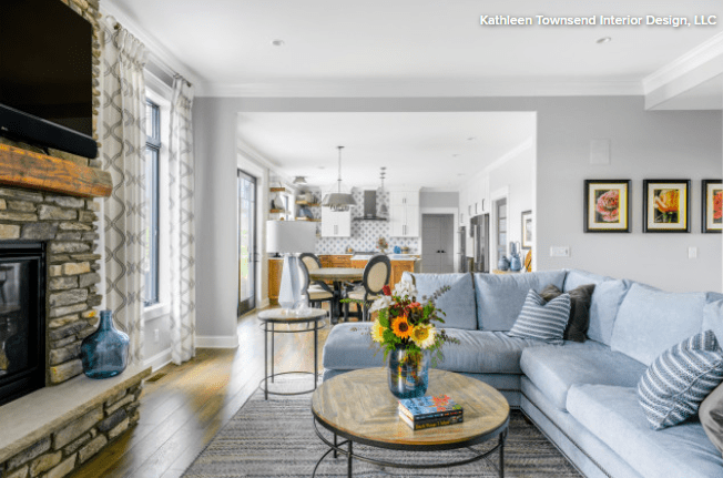 living room with kitchen in background
